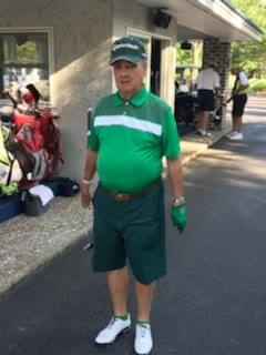 The Dapper Man in green